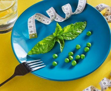 Diet blue plate with centimeter peas and basil